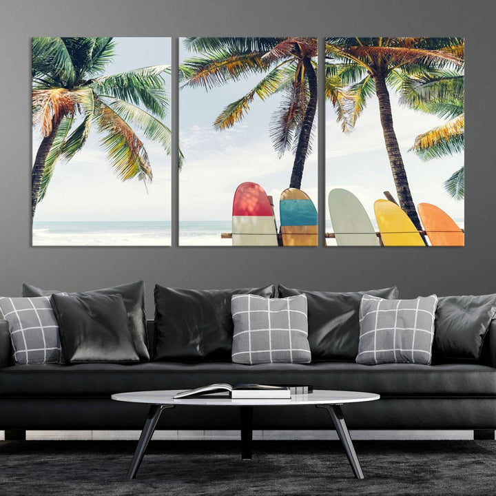 The room showcases The Palm and Surfing Board Wall Art Canvas Print, a triptych of palm trees and surfboards by the beach, elegantly gallery wrapped for a sophisticated finish.