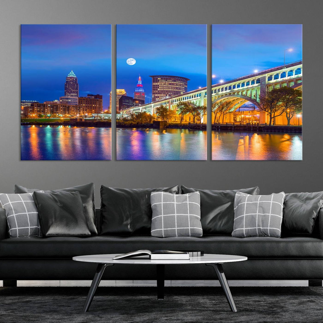 The Cleveland Night Skyline Wall Art City Cityscape Canvas Print portrays a city skyline and bridge lit up against the night sky. This artwork is printed on museum-quality canvas with a gallery-wrapped finish and features a UV-protective coating to ensure lasting vibrancy.