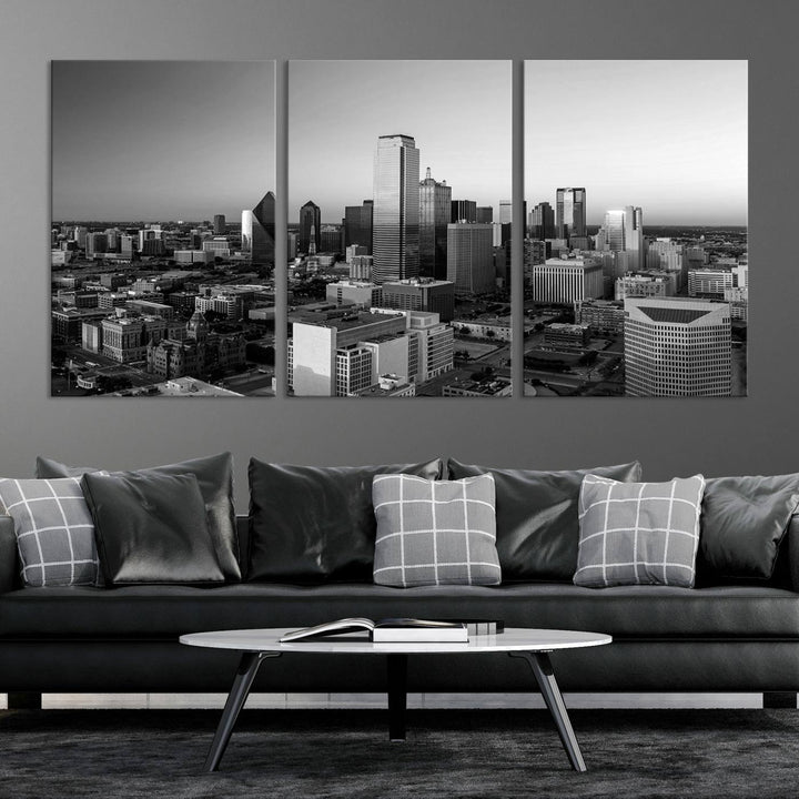 A modern living room showcases the Dallas City Lights Skyline Black and White Wall Art Cityscape Canvas Print. This gallery-wrapped piece offers a sleek finish and is crafted from museum-quality pollycotton. It features a UV-protective coating to ensure lasting vibrancy.