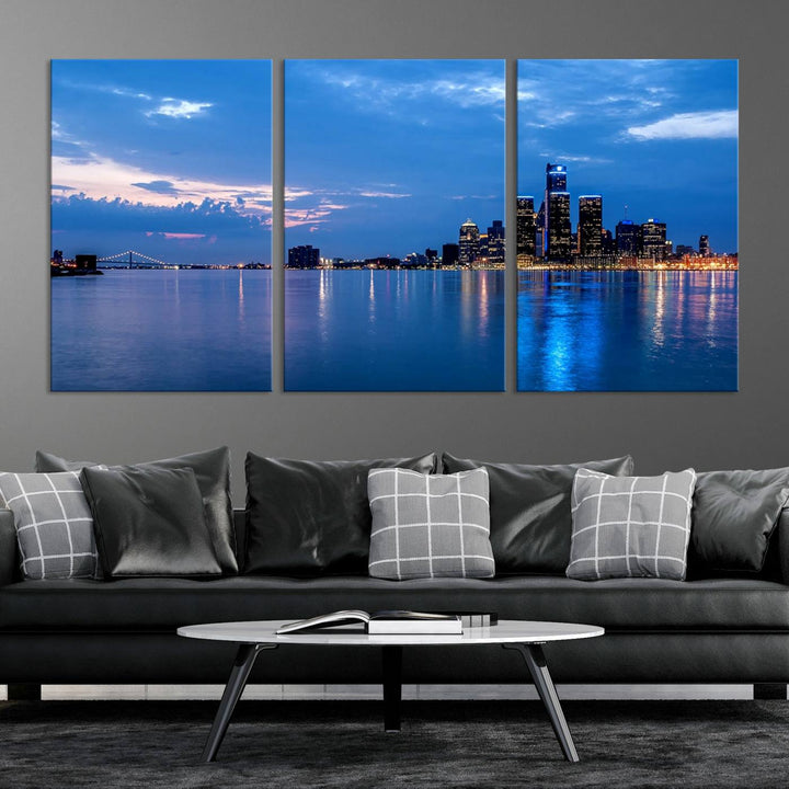 The "Detroit City Lights Night Blue Cloudy Skyline Cityscape View" wall art, displayed on museum-quality canvases, is split into three gallery-wrapped panels.