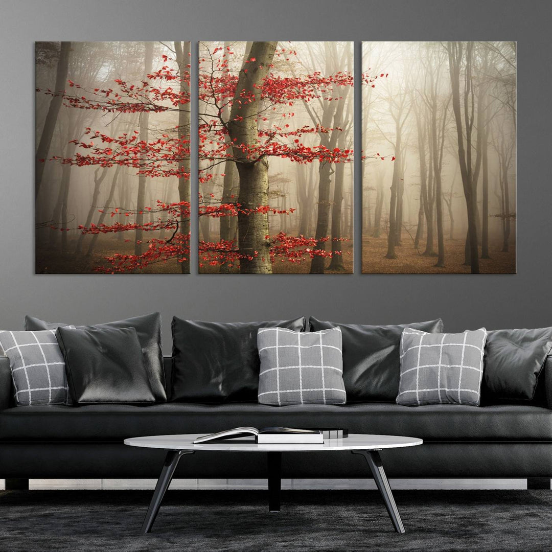 The living room features the Foggy Forest Wall Art, an Autumn Trees Canvas Print that showcases a serene nature scene with foggy woodland decor and a tree adorned in vibrant red leaves.