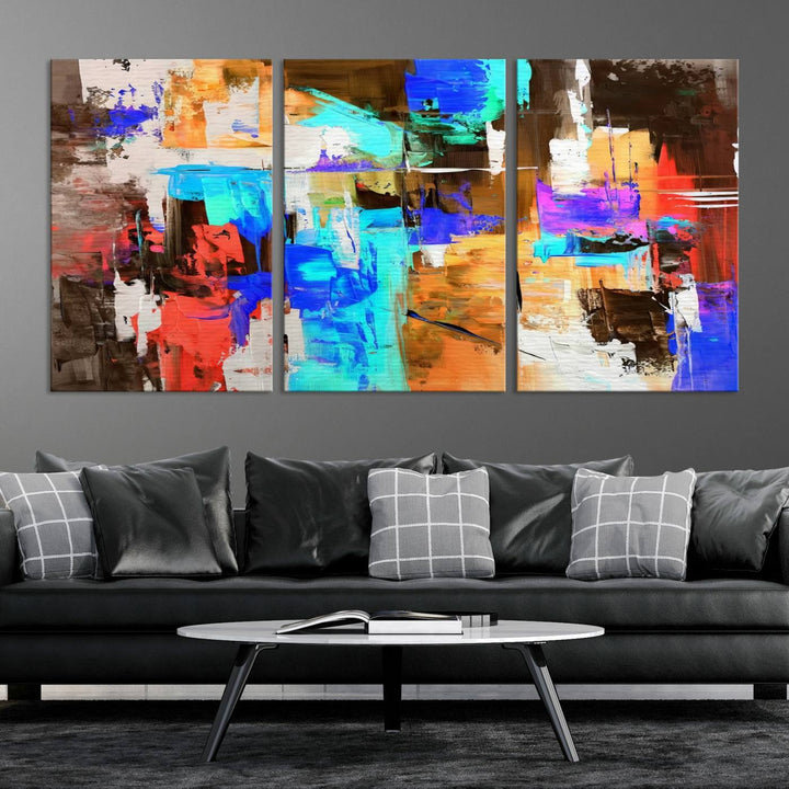 In a modern living room, the "Colorful Abstract Wall Art Canvas Print" serves as a stunning triptych centerpiece on museum-quality canvas, ready to hang. Its UV-protective coating ensures enduring vibrancy.