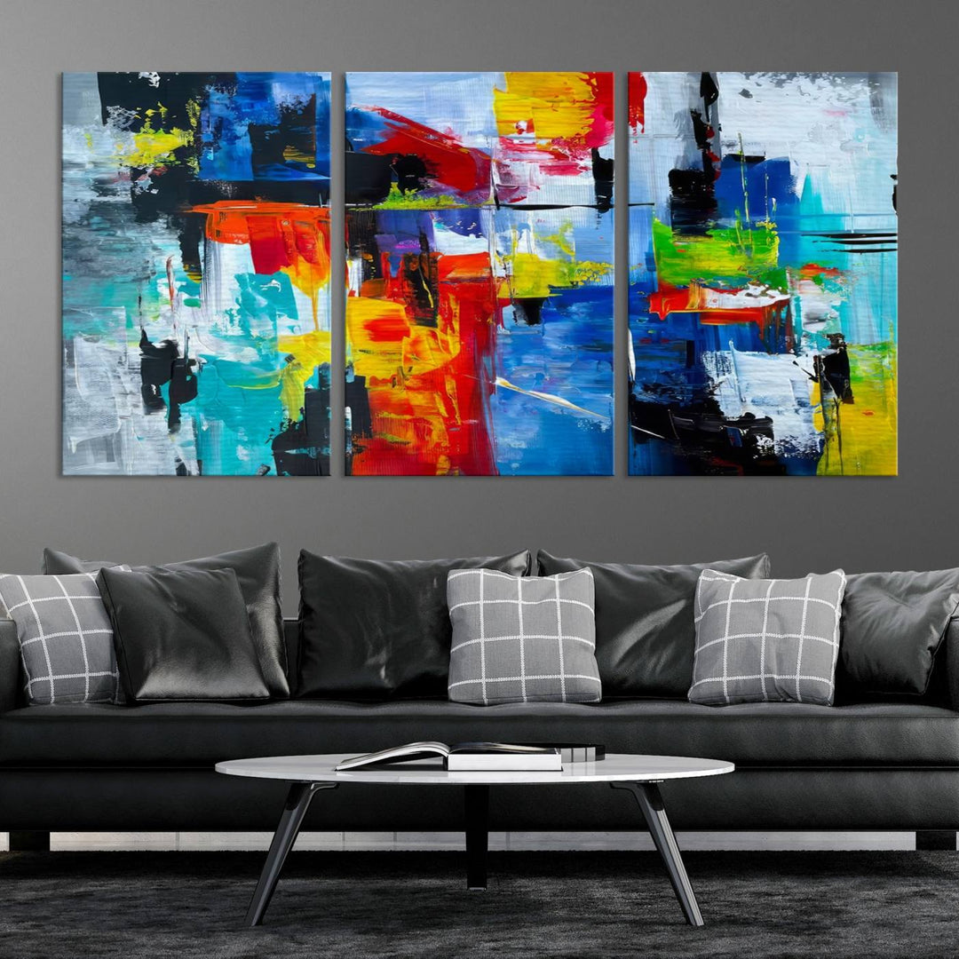 Three Colorful Abstract Wall Art Canvas Prints feature vibrant colors on museum-quality canvas and are finished with a UV-protective coating. Their ready-to-hang design allows for effortless transformation of your space.