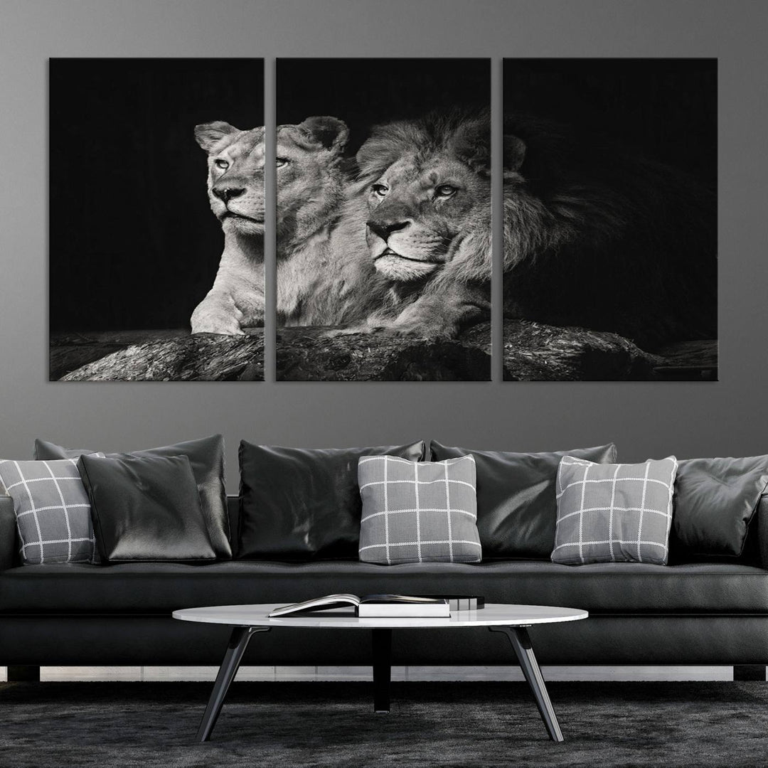 The elegant wildlife portrait, "Lion Couple Canvas Wall Art Print," featuring a black and white depiction of a lion family, majestically decorates the living room wall.