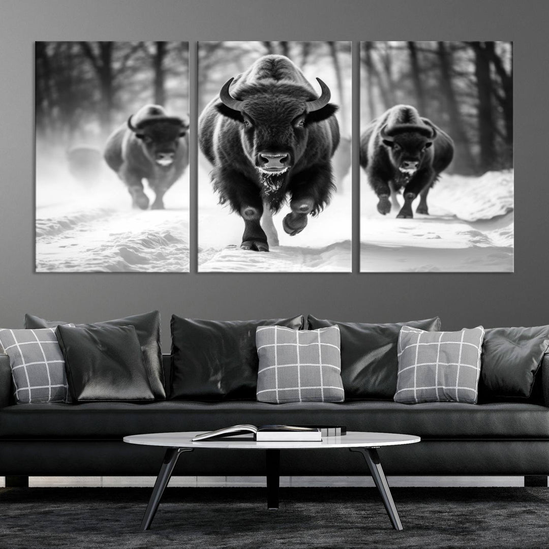 Transform your living room with the Buffalo Wall Art Canvas Print triptych, showcasing a bison family in motion across a snowy landscape. This striking Western decor piece becomes the focal point of any room.