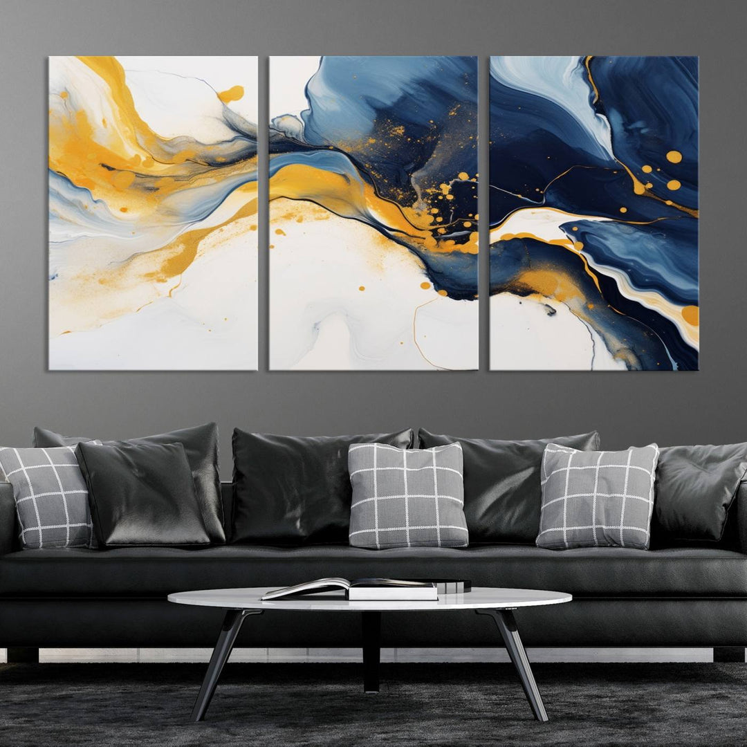 The Blue and Gold Abstract Fluid Canvas Art, with its swirling patterns, adorns the wall. This modern wall art beautifully complements the contemporary interior decor, adding an elegant touch with its rich blue, gold, and white tones.