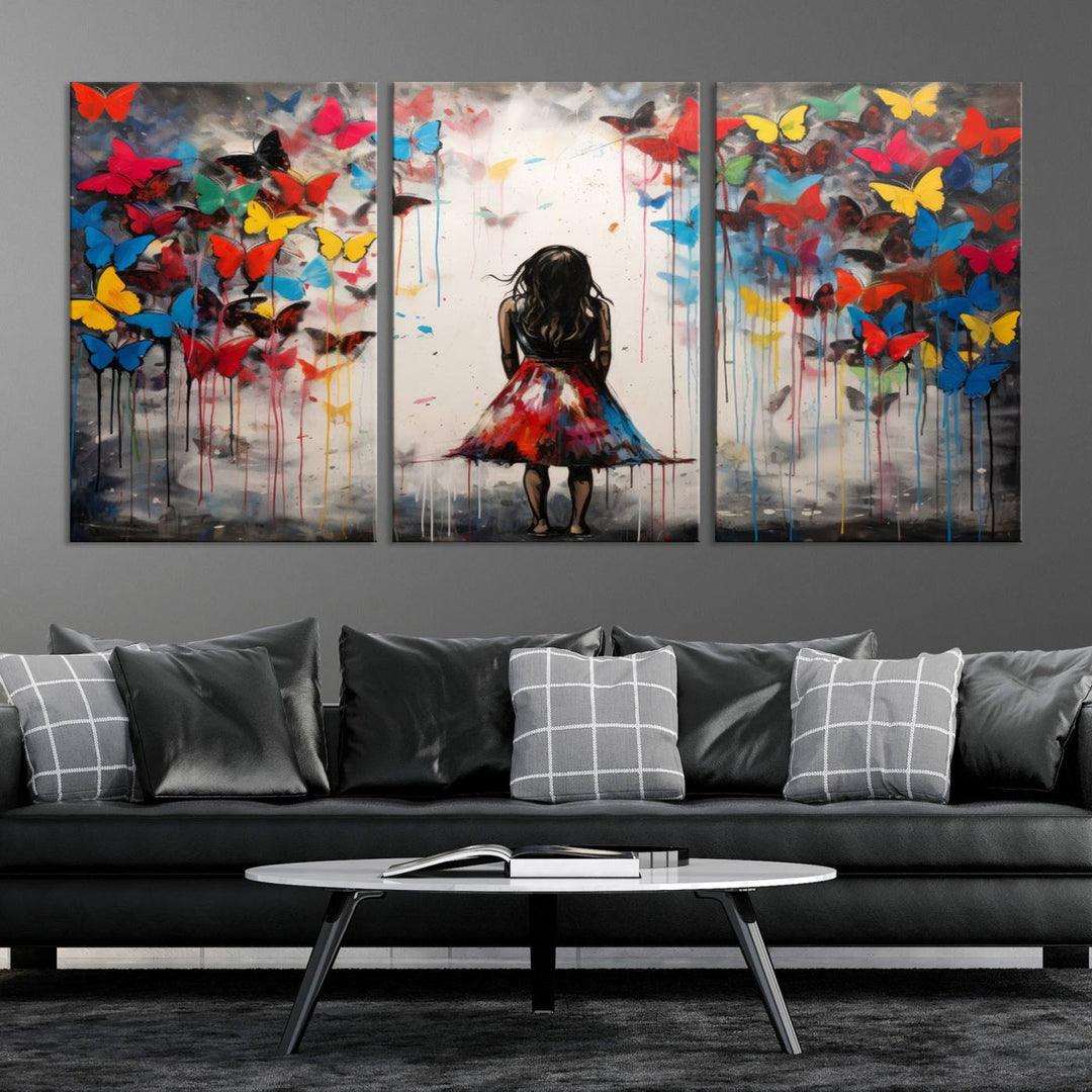 The Girl Butterfly Graffiti Abstract Canvas Print, featuring a vibrant depiction of a girl surrounded by butterflies on museum-quality canvas, is displayed prominently.