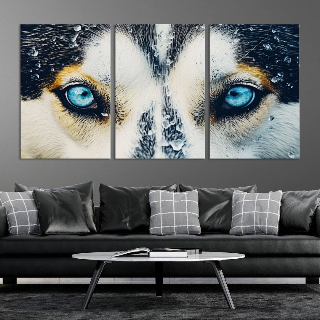 The captivating "Winter Siberian Husky Wolf EYE Wall Art Canvas Print" showcases the striking blue eyes of the animal portrait.