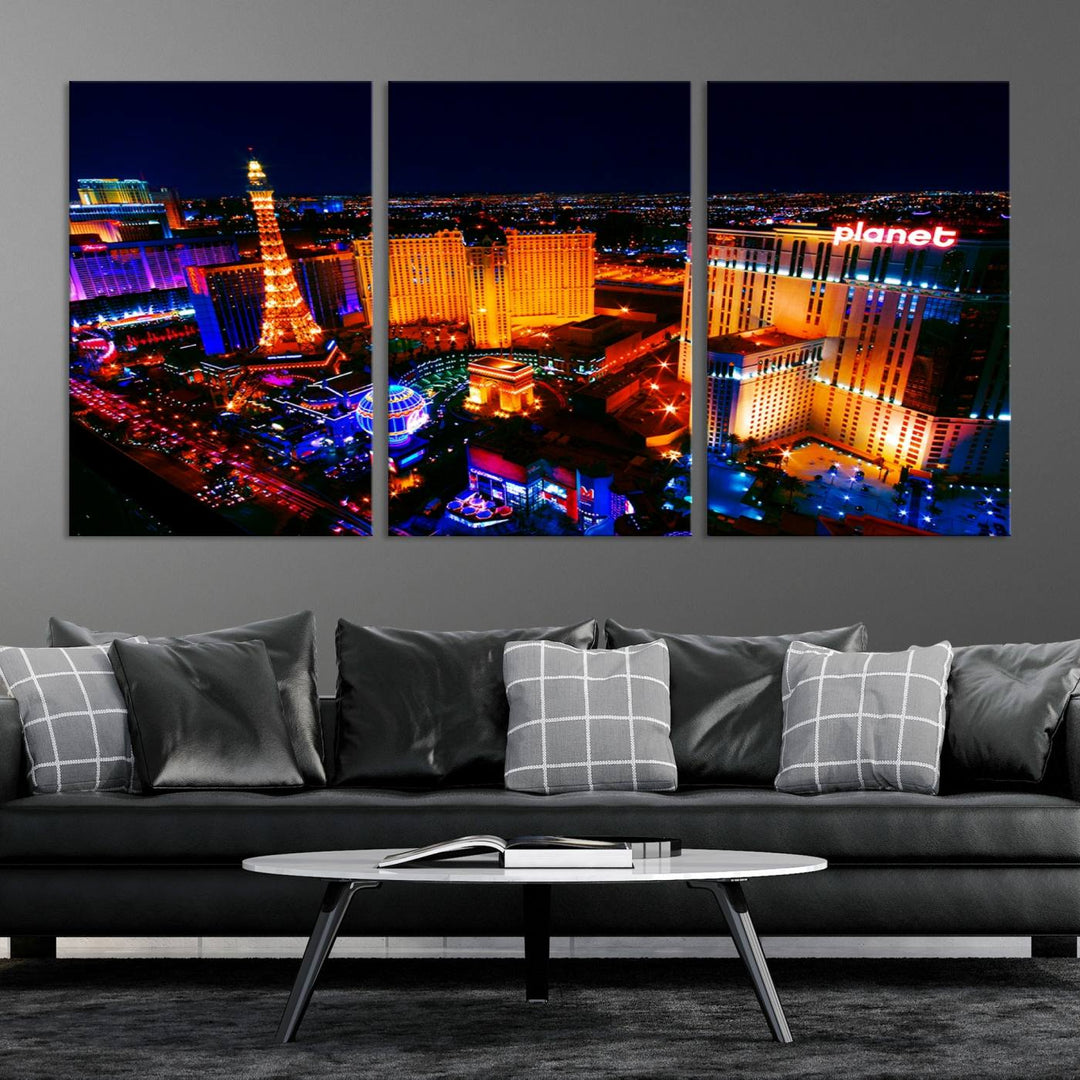 Las Vegas Wall Art Canvas Print showcases a dynamic and luminous cityscape at night with tall buildings and bustling streets. Expertly printed on museum-quality canvas, this gallery-wrapped artwork is enhanced with a UV-protective coating to ensure lasting brilliance.