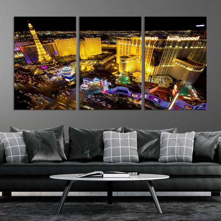 The modern living room features a Las Vegas Wall Art Canvas Print, a museum-quality triptych showcasing a vibrant cityscape with neon lights.