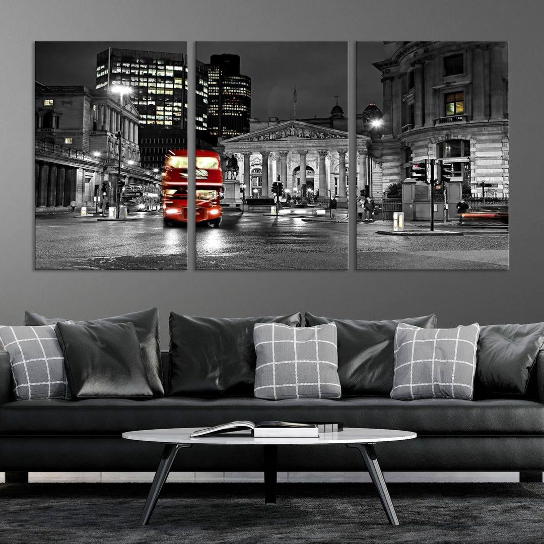 The London Night Red Bus Wall Art Canvas Print features a black and white cityscape with a moving red double-decker bus, crafted on museum-quality canvas with a UV-protective coating. This ready-to-hang artwork is designed to stand out and enhance any space.