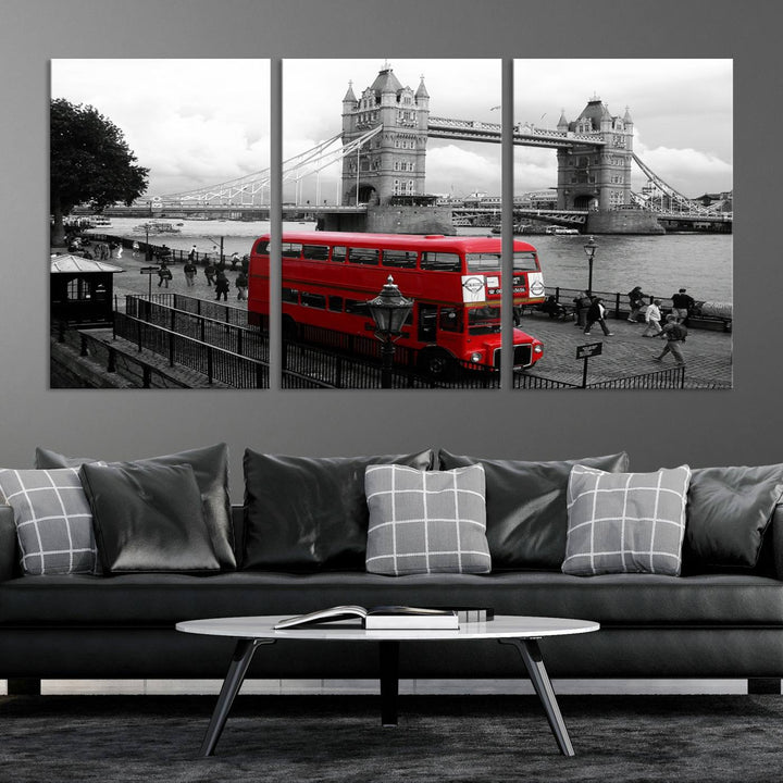 The London Red Bus and Bridge Wall Art Canvas Print showcases a red London bus in front of Tower Bridge, beautifully presented as a gallery-wrapped canvas. This striking image is divided into three panels, delivering a museum-quality display that's ready to hang.