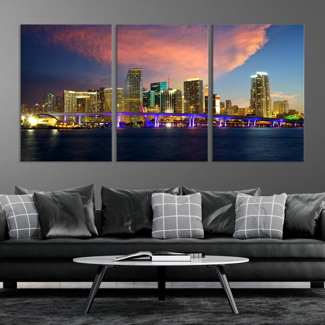 The modern living room is enhanced by the "Miami City Wall Art Canvas Print," a stunning triptych portraying a city skyline at sunset. These canvases are gallery wrapped and made from museum-quality materials, featuring a UV-protective coating to ensure lasting vibrancy.