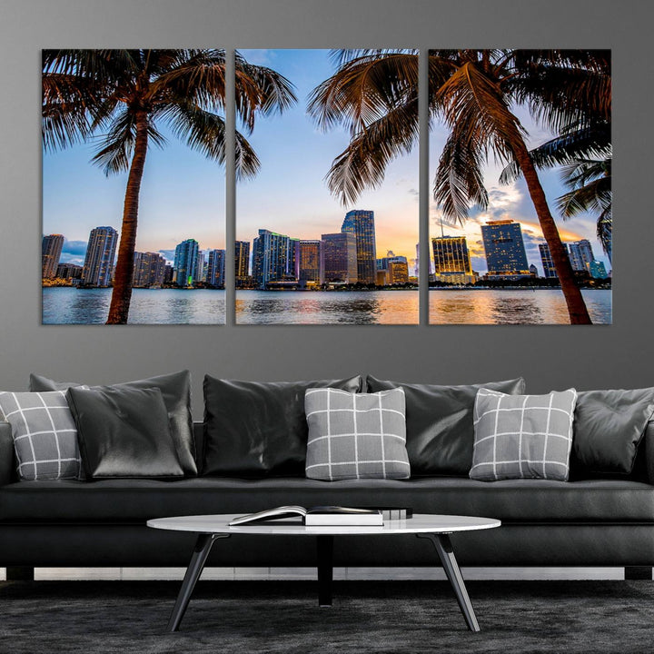 The Wall Art MIAMI Canvas Print features a triptych design depicting palm trees and a city skyline at sunset.