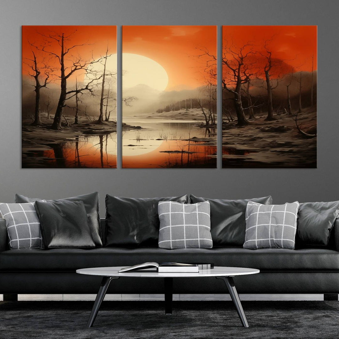 The "Abstract Watercolor Trees and Sunset on Lake Wall Art" is a triptych masterpiece, showcasing an orange-hued landscape of barren trees and a large sun. Displayed on museum-quality canvases with UV-protective coating, it creates a striking visual element in any space.