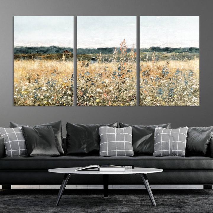 The "Wildflower Field Wall Art Canvas" brings rustic charm to the room with its nature-inspired landscape print, making it a perfect addition to the living room or office.