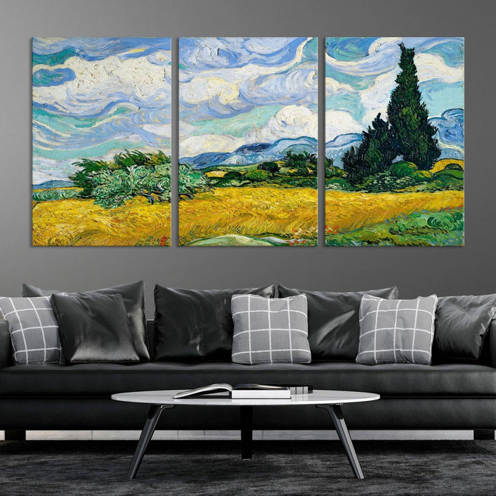 A contemporary living room features a large triptych of "Wheatfield With Cypresses By Van Gogh Painting Wall Art Canvas Print." Crafted on museum-quality canvas, this artwork brings a sense of elegance and craftsmanship reminiscent of professional artistry.