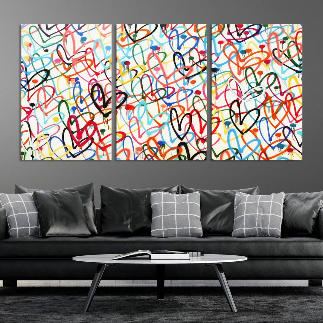 The "Colorful Love Canvas print," featuring vibrant abstract street art with overlapping loops, is handmade in the USA.