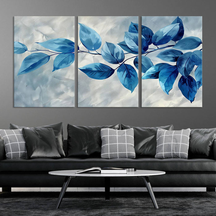 A Blue Leaf Abstract Wall Art Canvas Print, featuring a textured background and gallery-quality finish, is displayed.