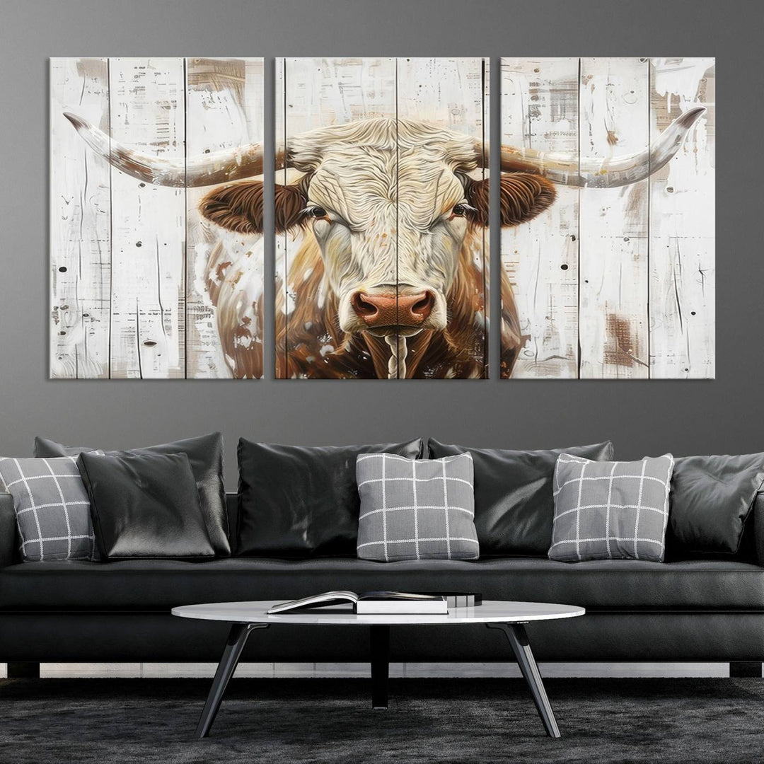 The dimly lit room is enhanced with Western charm by the Rustic Longhorn Bull Wall Art Canvas Set—Western-Inspired Farmhouse Décor, elegantly displayed on the wall.