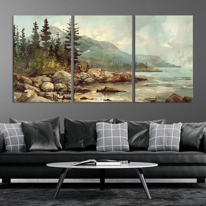 The living room features a breathtaking three-panel Abstract Acadia National Park Wall Art Canvas Print, which beautifully captures the rocky Maine coastline with trees and mountains.