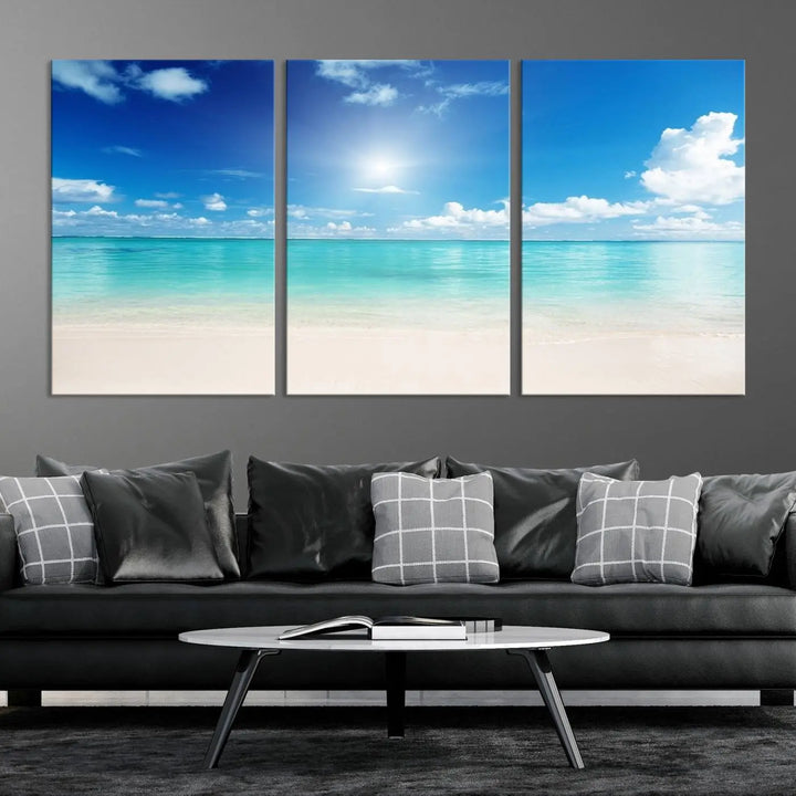 A contemporary living room showcasing the Wall Art Canvas Light Blue Beach and Ocean View.