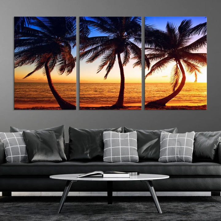 The living room features a wall adorned with the "Wall Art Canvas Curve Palms at Sunset on Beach," showcasing gallery-wrapped, museum-quality canvases in a stunning triptych.