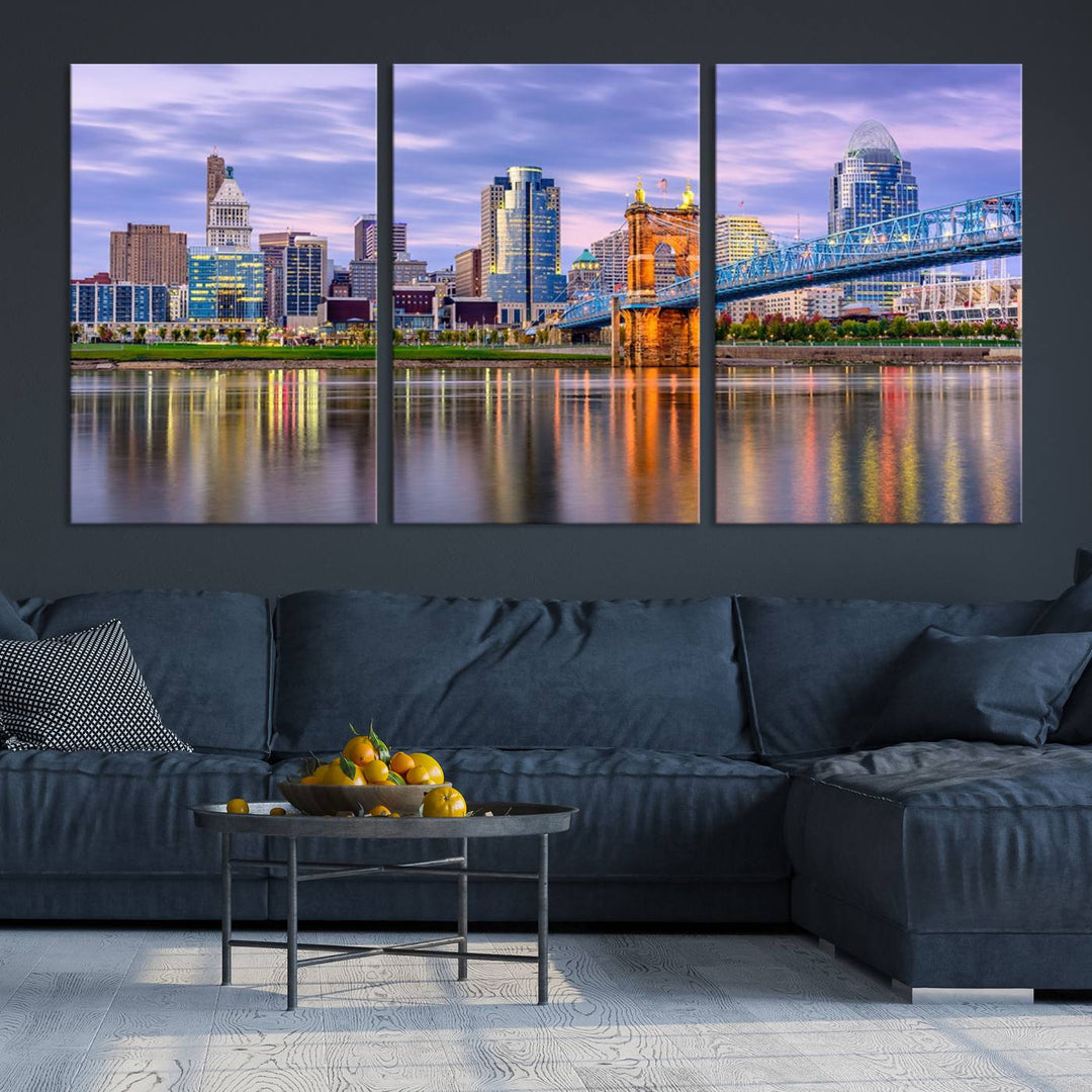 The wall art titled "Cincinnati City Lights Sunset Purple Cloudy Skyline Cityscape View" is beautifully printed on museum-quality canvases with a UV-protective coating and is ready to hang.