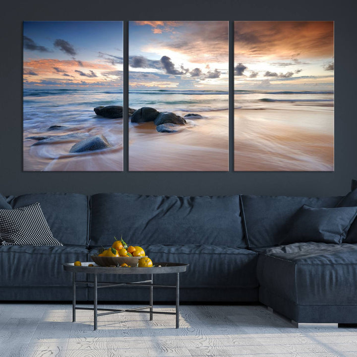 The "Serene Weather On The Beach Wall Art Canvas Print," featuring a tranquil beach scene with rocks and waves, is ready to hang and enjoy.