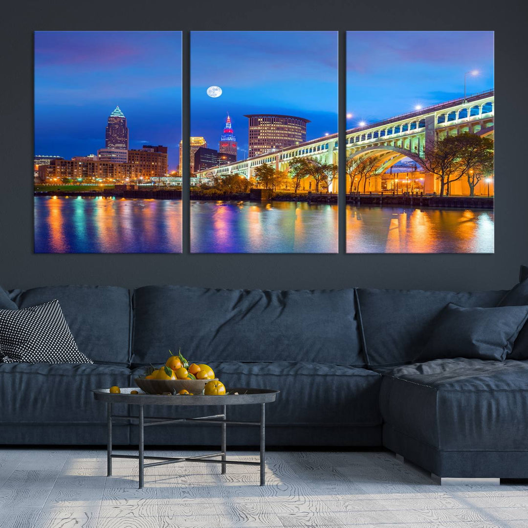 The Cleveland Night Skyline Wall Art City Cityscape Canvas Print portrays a city skyline and bridge lit up against the night sky. This artwork is printed on museum-quality canvas with a gallery-wrapped finish and features a UV-protective coating to ensure lasting vibrancy.