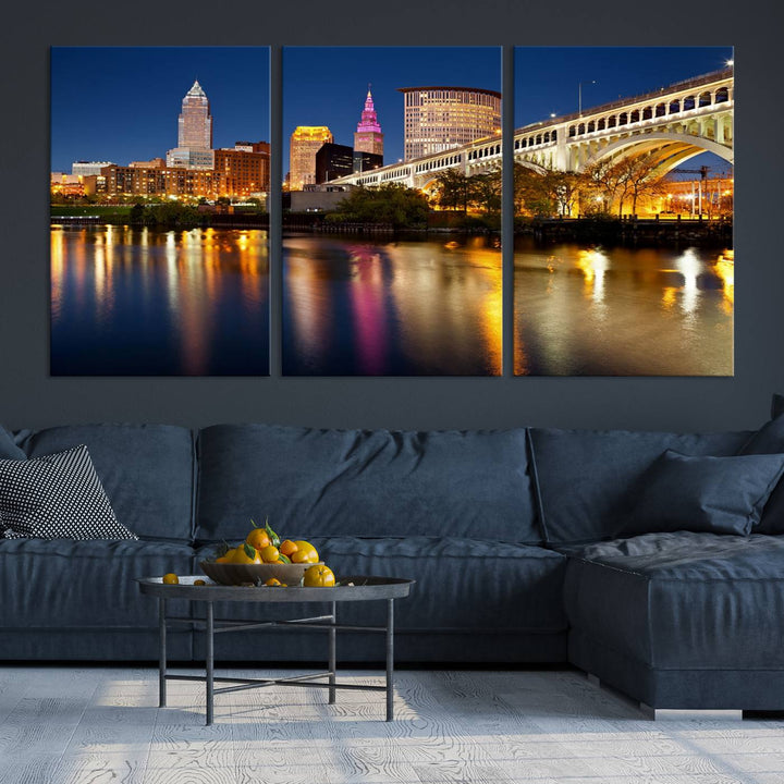 The "Cleveland Night Skyline Wall Art City Cityscape Canvas Print" is a striking feature in the room, showcasing a city skyline with a bridge reflecting in a river. Displayed on museum-quality canvas, it offers enduring beauty.