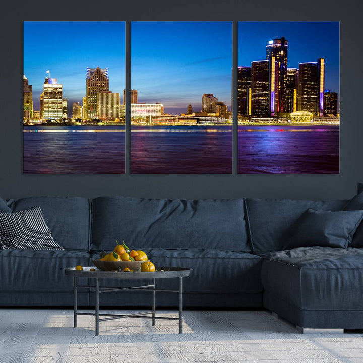 The living room features a breathtaking canvas print titled "Detroit City Lights Night Bright Blue Skyline Cityscape View," presented in a stunning triptych format on museum-quality canvases that are ready to hang.