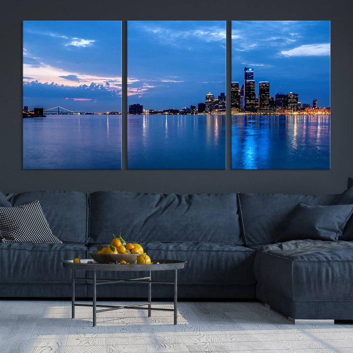 The "Detroit City Lights Night Blue Cloudy Skyline Cityscape View" wall art, displayed on museum-quality canvases, is split into three gallery-wrapped panels.