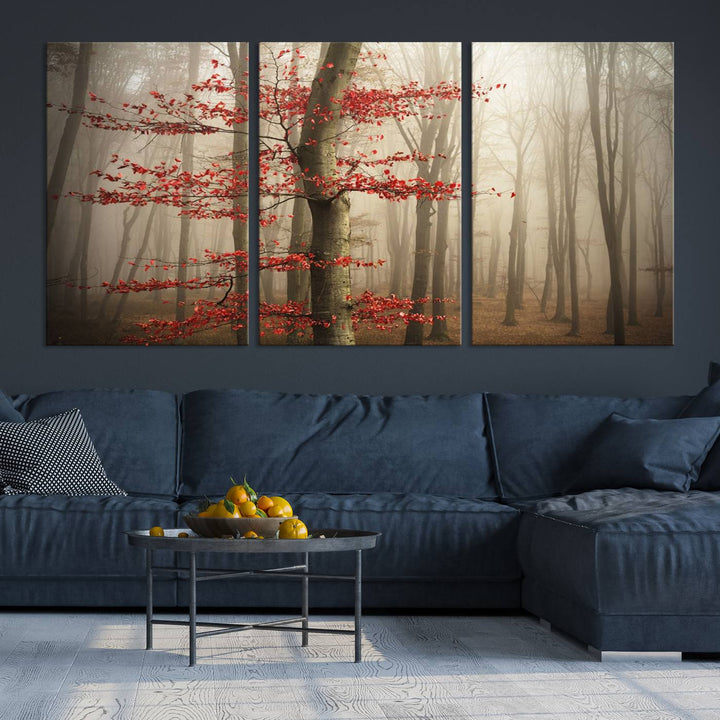 The living room features the Foggy Forest Wall Art, an Autumn Trees Canvas Print that showcases a serene nature scene with foggy woodland decor and a tree adorned in vibrant red leaves.