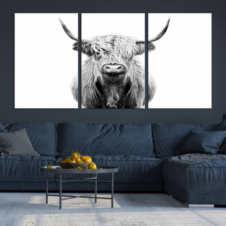 The wall art features a triptych of a Scottish Highland cow, printed on museum-quality canvases with a UV-protective coating. This decorative piece is known as the Highland Cow Canvas Wall Art Farm House Wall Art.