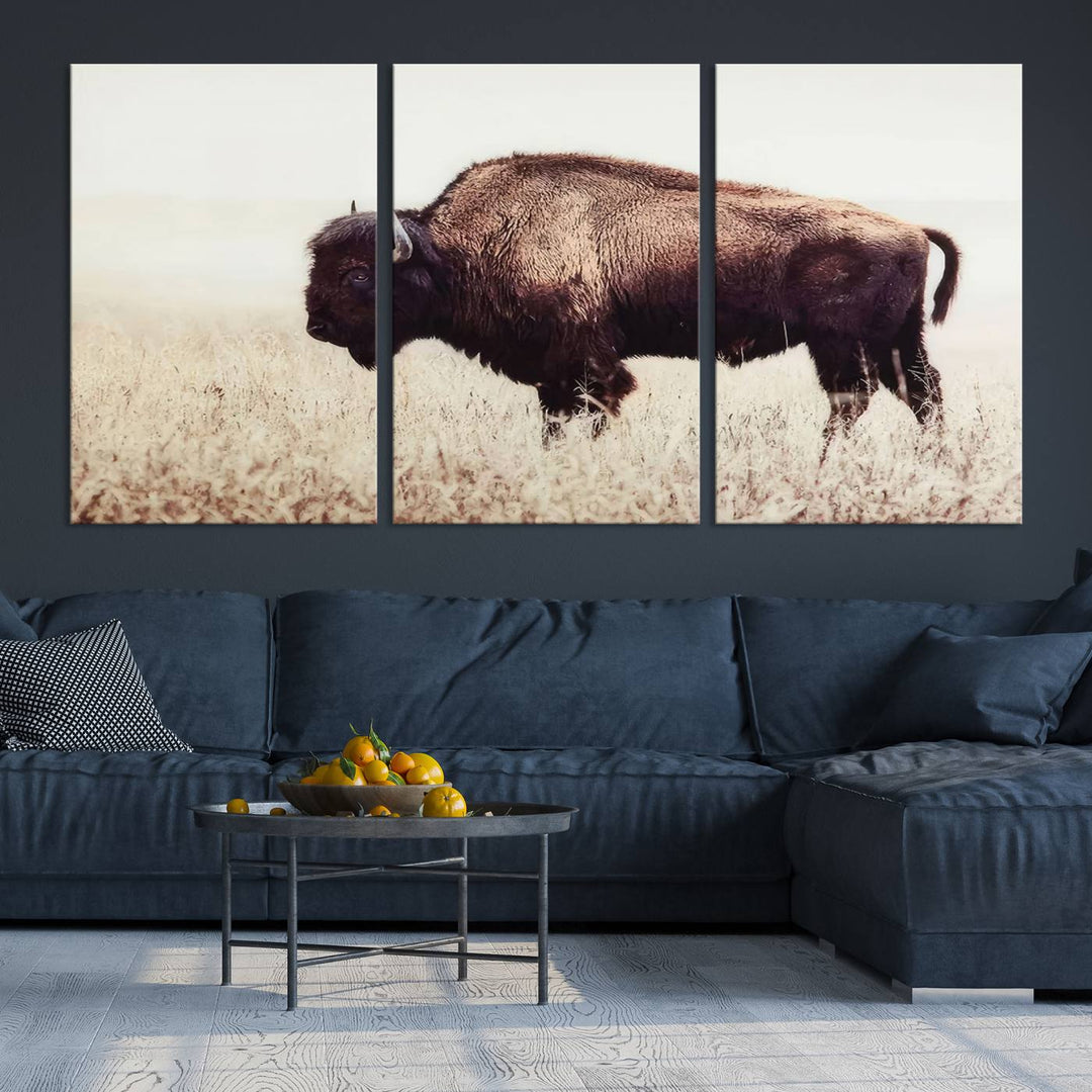 A stylish living room showcases the captivating "Bison in Field" Wall Art Canvas Print as farmhouse decor.