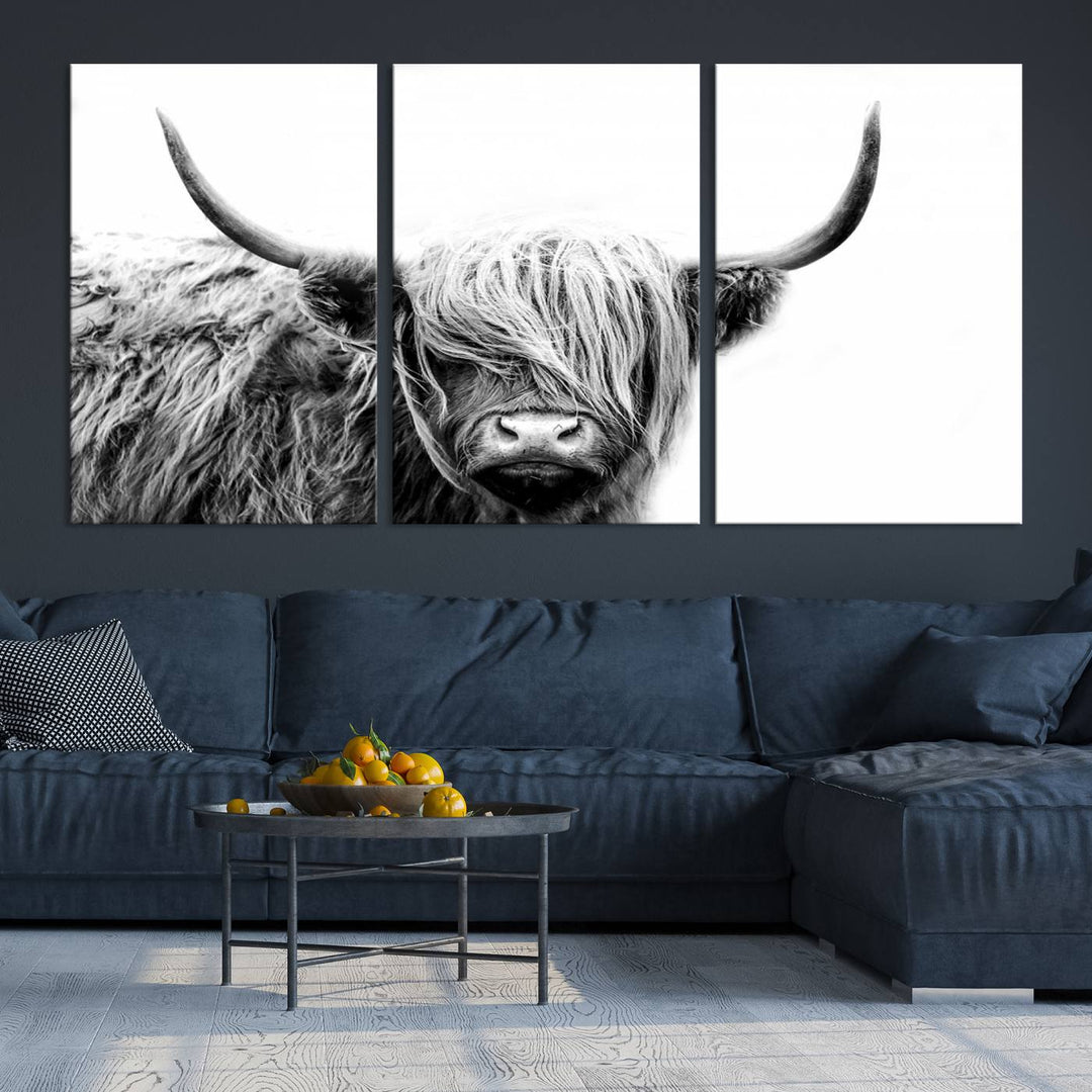 A museum-quality triptych titled "Black White Scottish Highland Cow Cattle Art Print Farmhouse Wall Art Canvas Print" embellishes the dark wall. The canvas is equipped with a UV-protective coating to ensure lasting vibrancy.