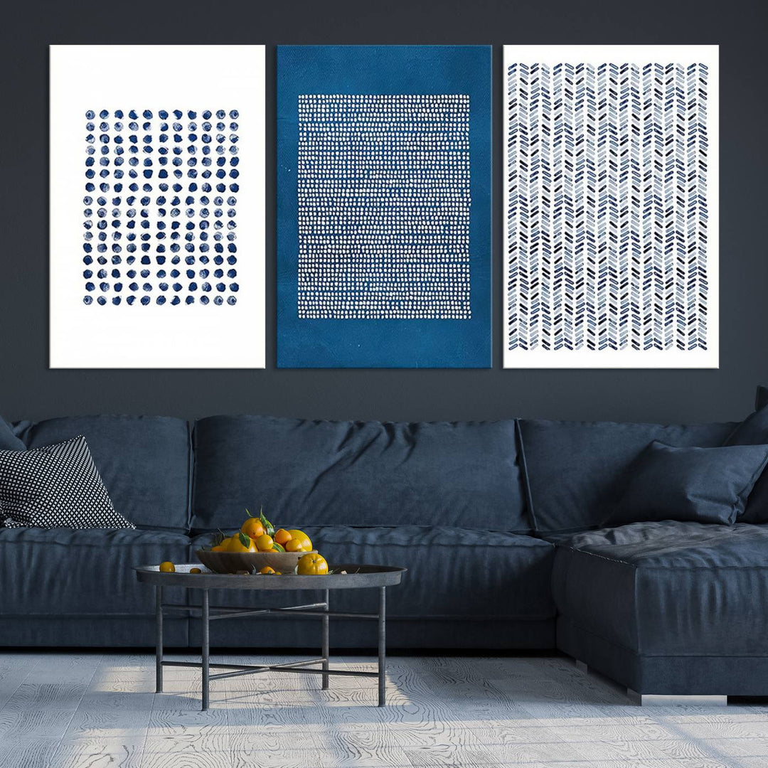 The modern living room is beautifully complemented by the "Canvas Print Wall Art Set Navy Blue White Geometric Dot Collage Abstract Illustr Art" on the wall. This art is printed on museum-quality canvas with a UV-protective coating for enhanced durability and vibrancy. Each piece is ready to hang, offering an effortless upgrade to your space.