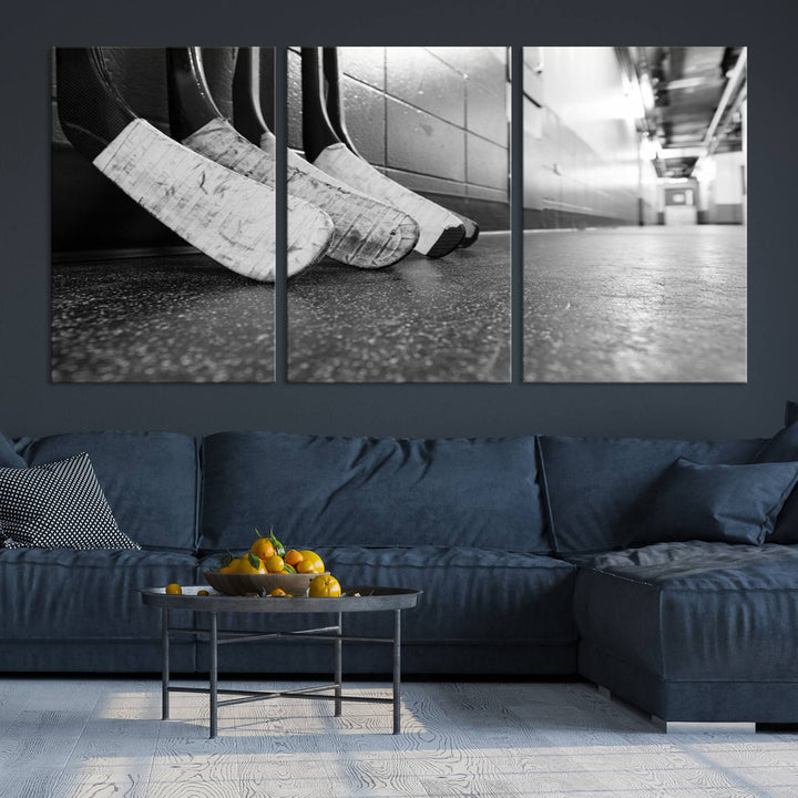 A living room featuring a large Ice Hockey Wall Art Canvas Print on gallery-wrapped canvas.