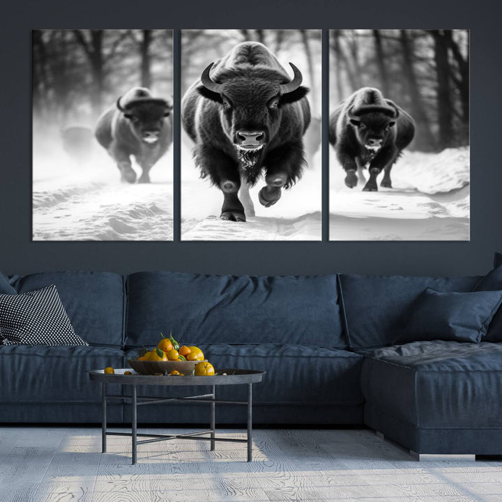 Transform your living room with the Buffalo Wall Art Canvas Print triptych, showcasing a bison family in motion across a snowy landscape. This striking Western decor piece becomes the focal point of any room.