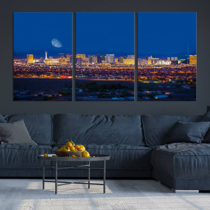 The Las Vegas Wall Art Canvas Print, depicting a city skyline at night, enhances a modern living room with its museum-quality canvas. This triptych comes ready to hang and boasts a UV-protective coating for lasting brilliance.