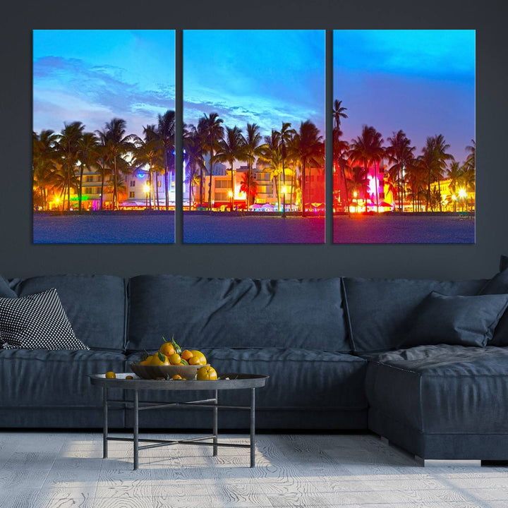 The living room features a three-panel Miami City Wall Art Canvas Print, showcasing a colorful, illuminated beach scene with palm trees on museum-quality canvas.