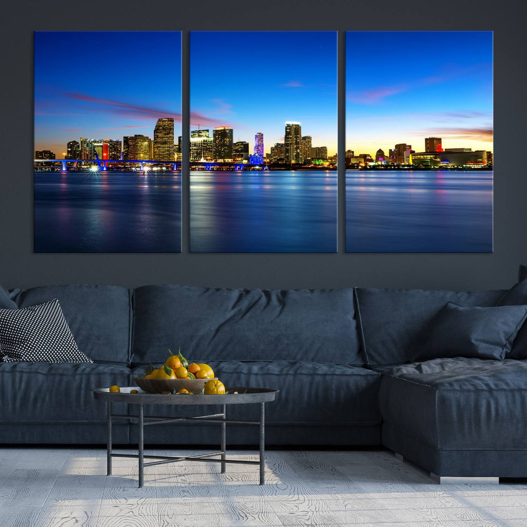 The living room features a Miami City Wall Art Canvas Print—a gallery-wrapped triptych displaying a city skyline at dusk, adding museum-quality elegance to the space.