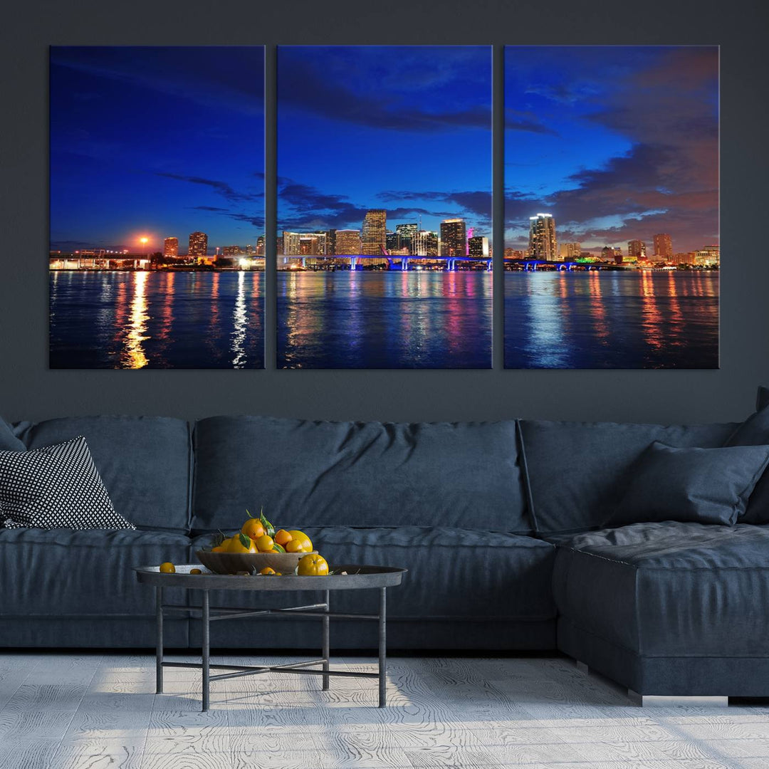 A large Miami City View Wall Art Canvas Print featuring the Miami City Skyline Panorama at night is displayed above the dresser.