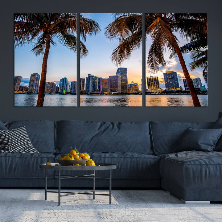 The Wall Art MIAMI Canvas Print features a triptych design depicting palm trees and a city skyline at sunset.