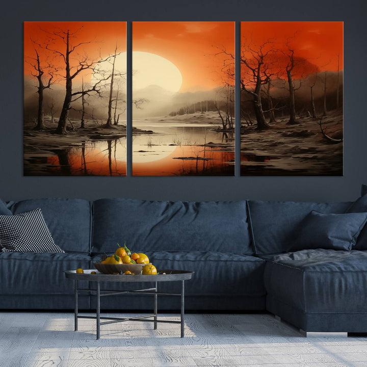 The "Abstract Watercolor Trees and Sunset on Lake Wall Art" is a triptych masterpiece, showcasing an orange-hued landscape of barren trees and a large sun. Displayed on museum-quality canvases with UV-protective coating, it creates a striking visual element in any space.