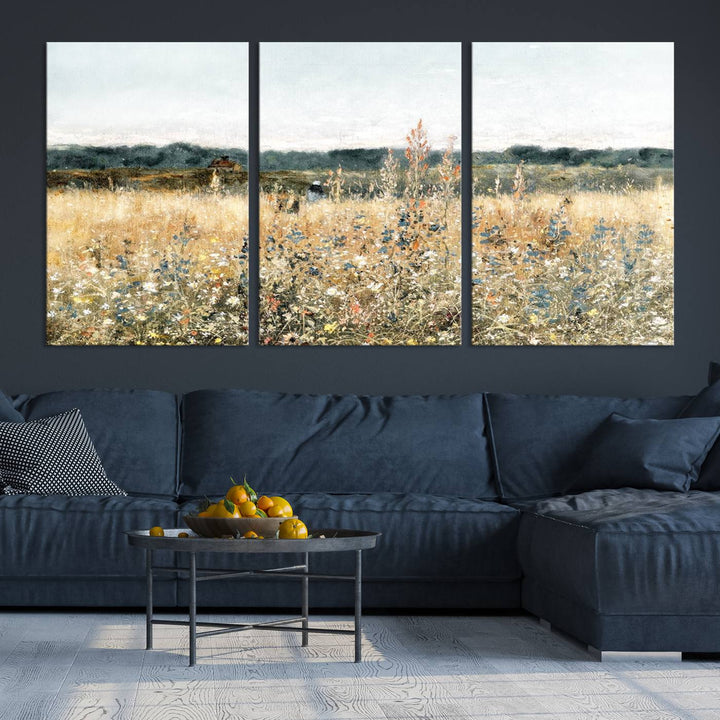 The "Wildflower Field Wall Art Canvas" brings rustic charm to the room with its nature-inspired landscape print, making it a perfect addition to the living room or office.