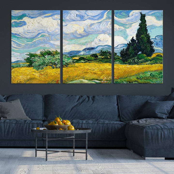 A contemporary living room features a large triptych of "Wheatfield With Cypresses By Van Gogh Painting Wall Art Canvas Print." Crafted on museum-quality canvas, this artwork brings a sense of elegance and craftsmanship reminiscent of professional artistry.