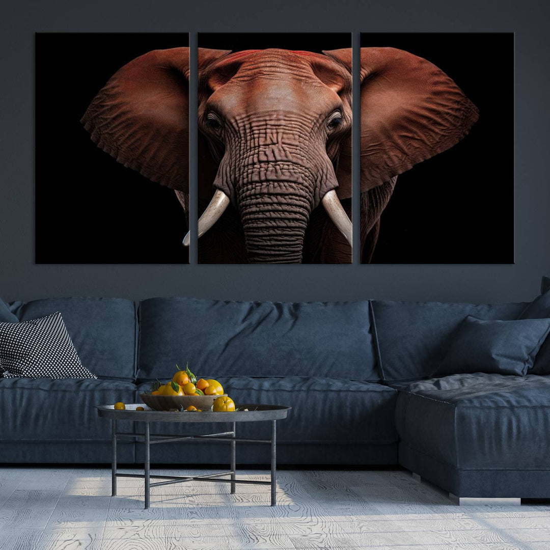 A stunning triptych titled "Wild Elephant Wall Art Canvas Print" beautifully enhances the wall above a contemporary living room. This Africa Savannah Wild Animal Wall Decor Print is of museum-quality, complete with a UV-protective coating to ensure its vibrancy and beauty are preserved for years.