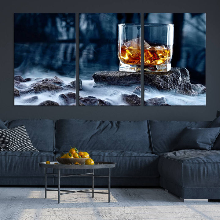 The Whiskey Ice Wall Art Canvas Print, a triptych featuring a glass of whiskey on the rocks, is crafted with a gallery-quality finish on premium canvas.